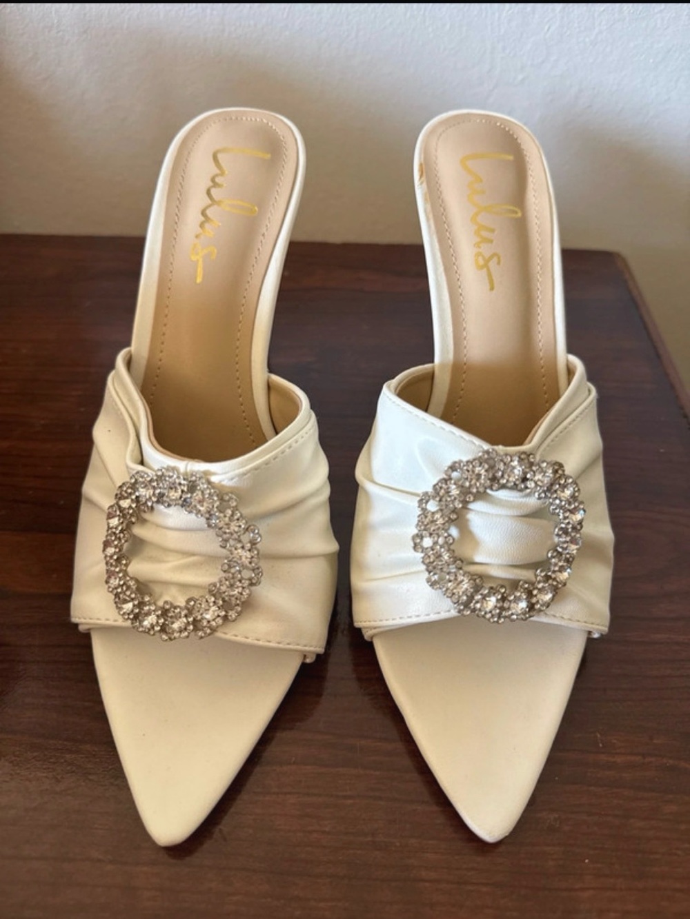 Lulu's Ivory Satin Pointed Toe Mules with Crystal Circle Buckles